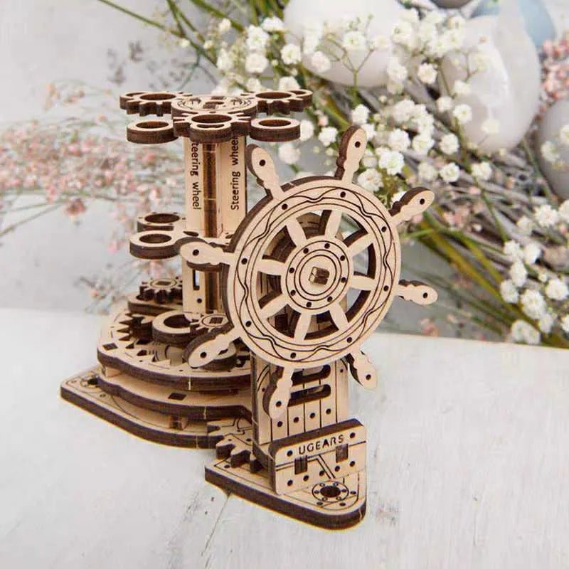 Wooden steering wheel model pen holder rotating on a desk with pens.