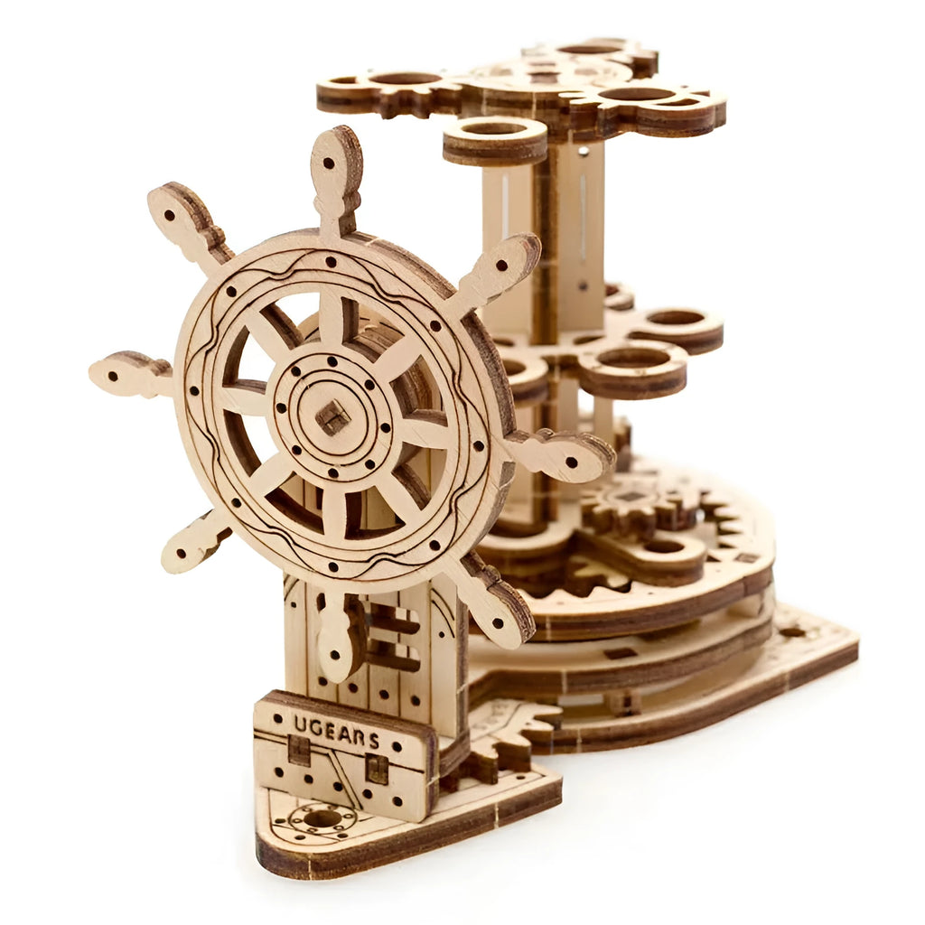 Wooden steering wheel model pen holder rotating on a desk with pens.