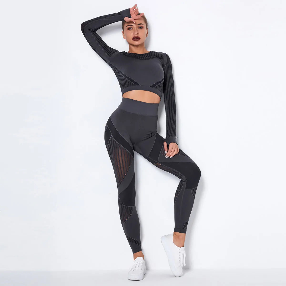 Seamless knitted long-sleeved yoga suit for women in a solid colour, showing full-length design.