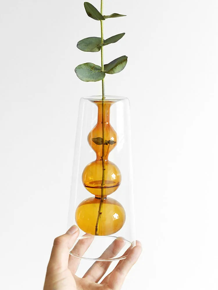 Retro stained glass gourd vase in green, pink, or yellow for hydroponic flowers on a countertop