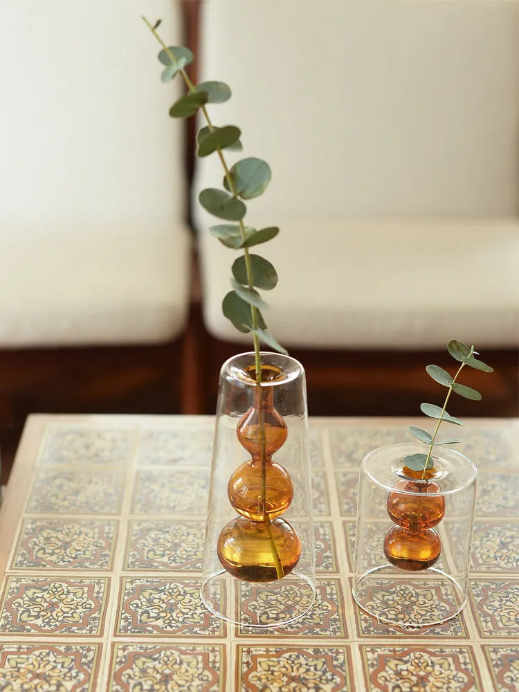 Retro stained glass gourd vase in green, pink, or yellow for hydroponic flowers on a countertop