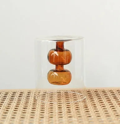 Retro stained glass gourd vase in green, pink, or yellow for hydroponic flowers on a countertop