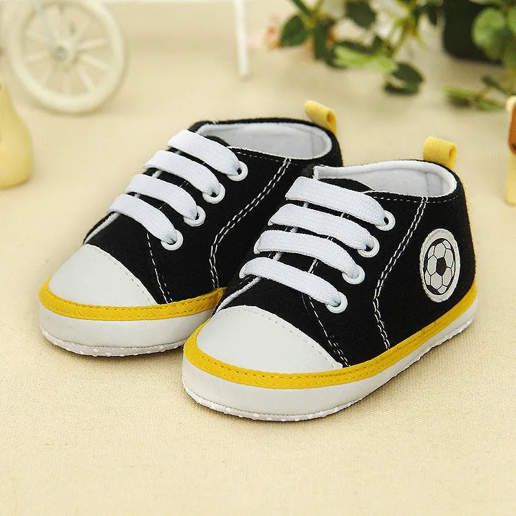 Baby canvas shoes with non-slip sole, stripe pattern, car stitching, in football grey, blue, navy, black or red.