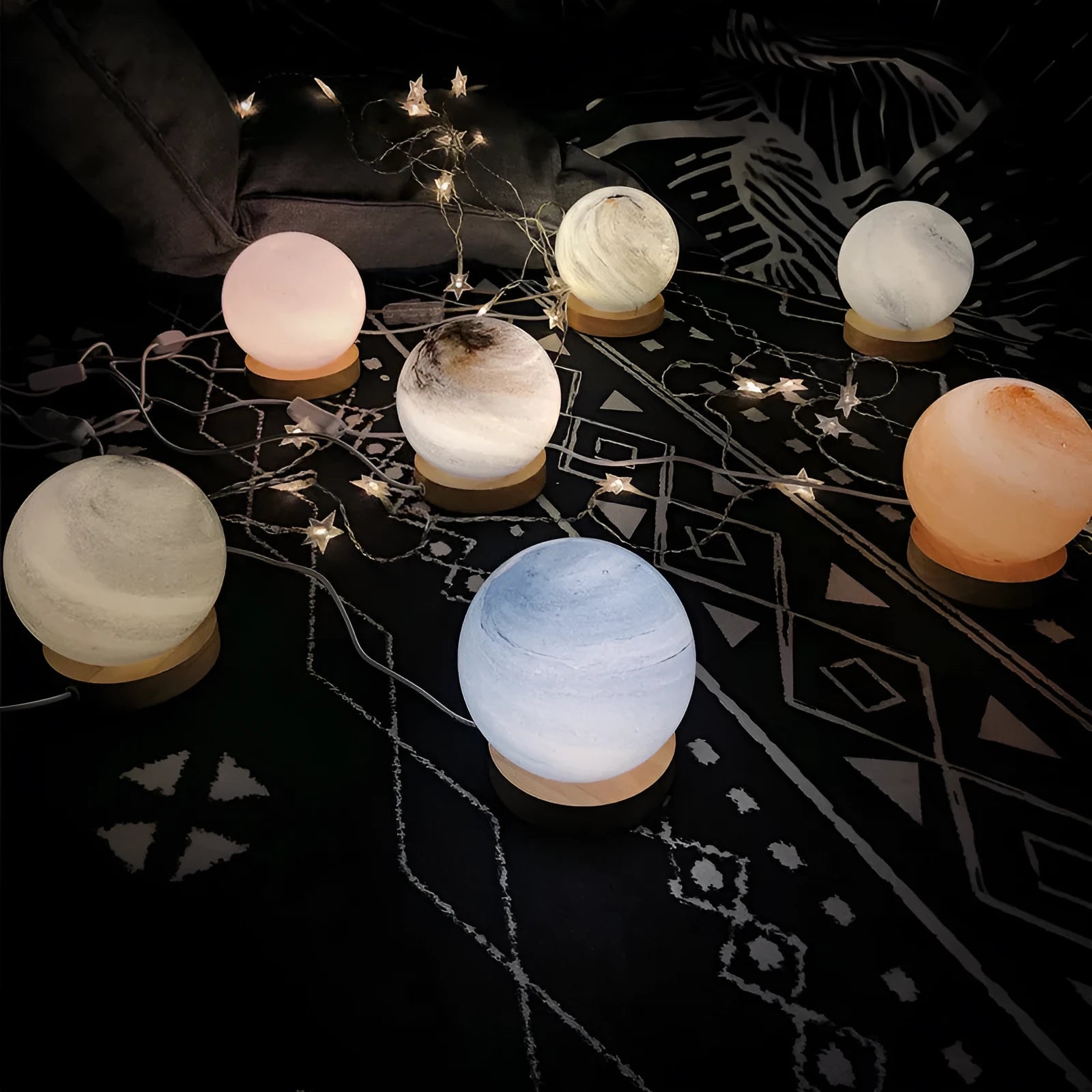 Nordic style table lamp with coloured glass shade on a bedside table