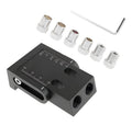 Black aluminium alloy woodworking perforation locator tool with 15-degree angle and drill bits