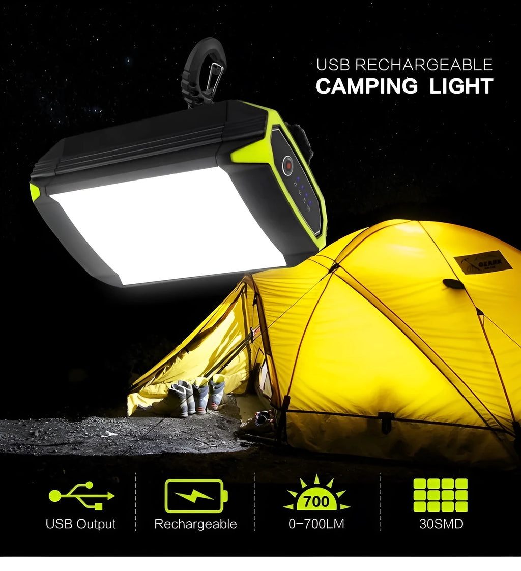 Green aluminium rechargeable camping light with USB port and push-button controls