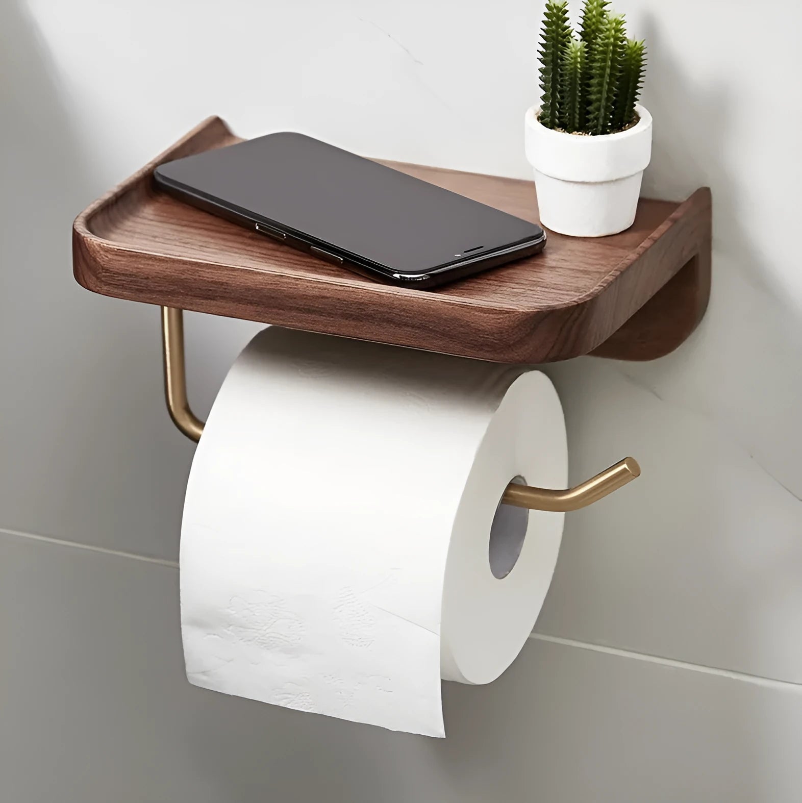 Solid walnut wood wall-mounted paper towel rack with brass fittings in natural wood colour.