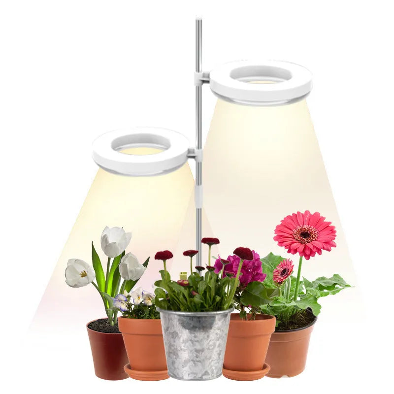 Full spectrum LED plant growth lamp with PC shell on desk with indoor plants