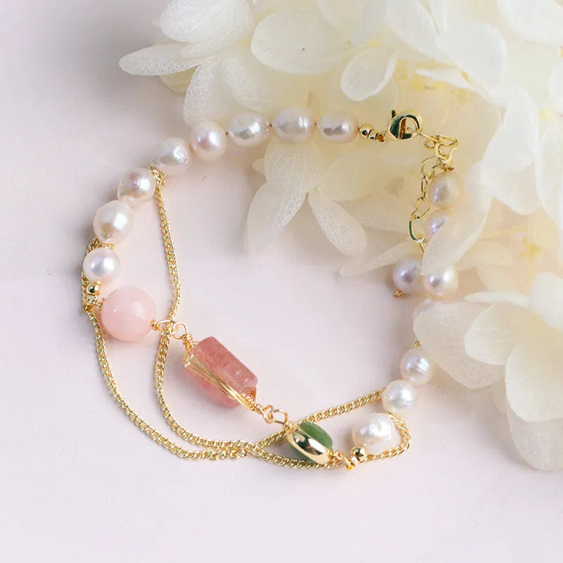 Women's freshwater pearl bracelet with geometric design and strawberry crystal accents