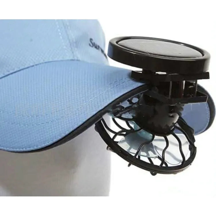 Black solar-powered clip-on cooling fan with solar panel for outdoor camping and travel