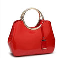 Plain women's polyester handbag in choice of colours showing card slot and dual shoulder straps.