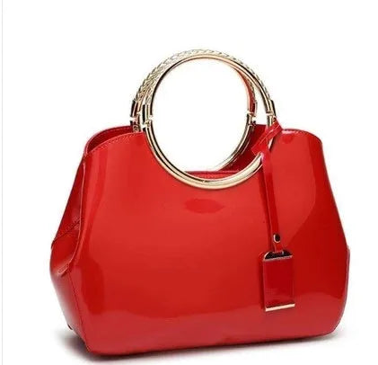 Plain women's polyester handbag in choice of colours showing card slot and dual shoulder straps.