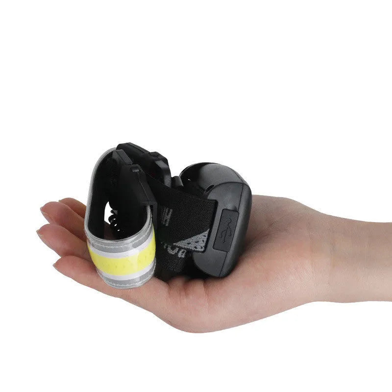 COB LED headlamp with built-in 1800mAh rechargeable battery, adjustable headband, and USB cable, shown in black.