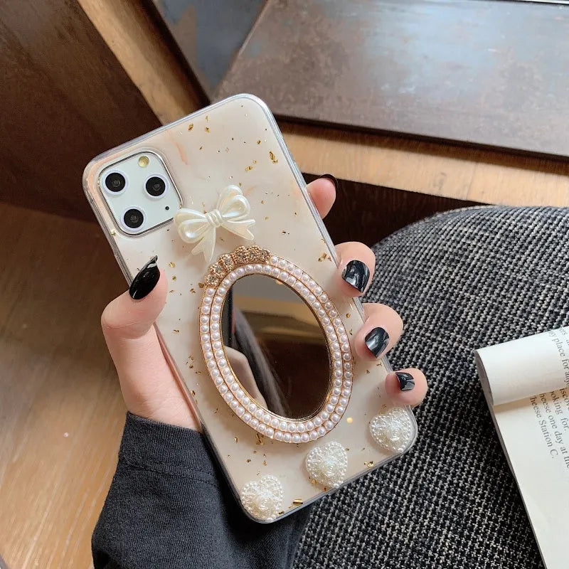 Brown marble pattern silicone iPhone case with bowknot rhinestone accents and integrated mirror