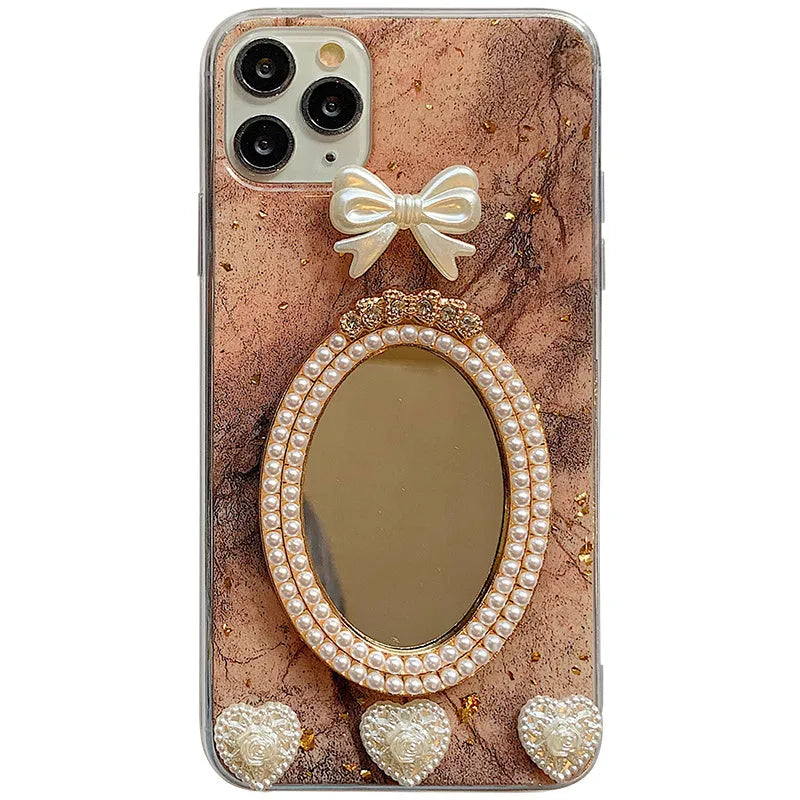 Brown marble pattern silicone iPhone case with bowknot rhinestone accents and integrated mirror