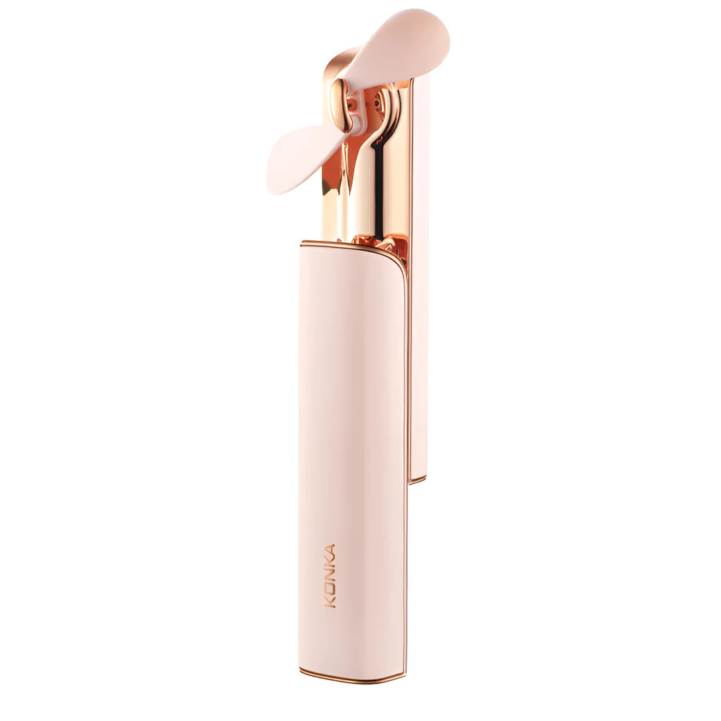 Pink handheld mini fan with folded design next to a USB charging cable.