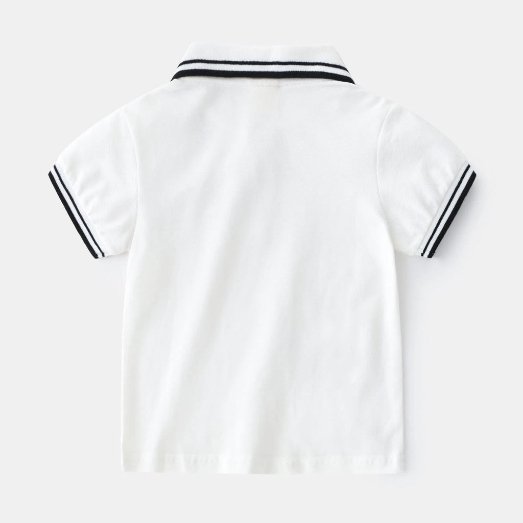 Boys white and black cotton polo shirt with short sleeves and a round neck