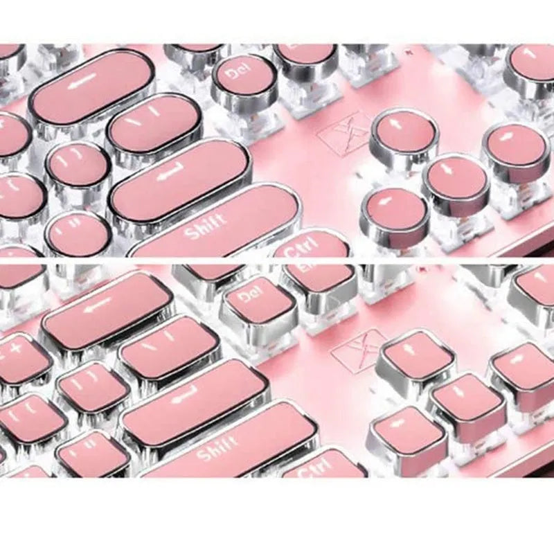 Queen Lipstick mechanical keyboard with green switches, silver bottom, and pink backlight on desk