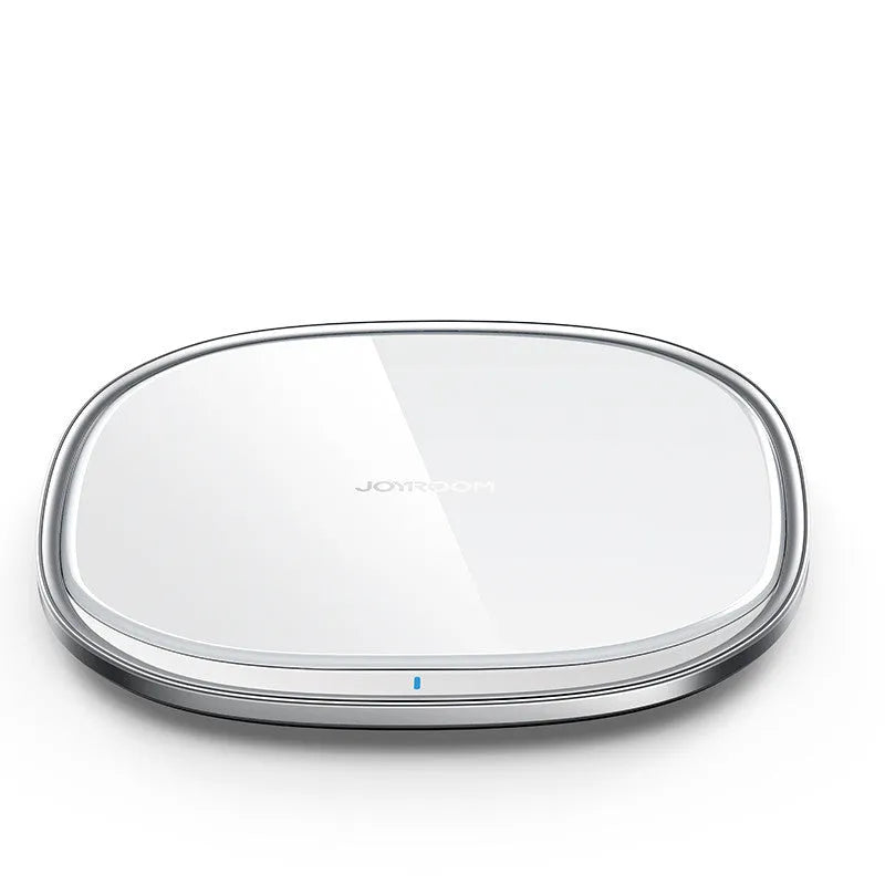 Black 15W square wireless charging pad with a glass top on a desk