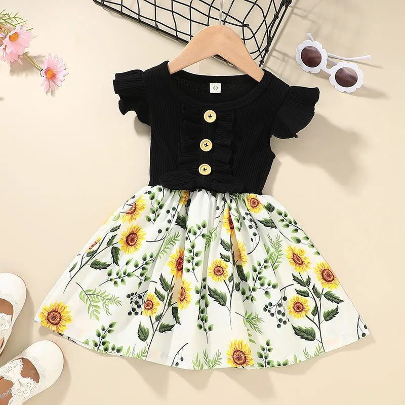 Toddler girl in sleeveless summer dress showing colour options and size range 80-120cm