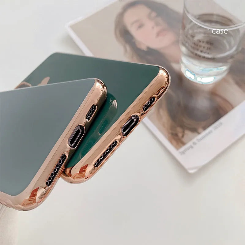A solid colour TPU back cover case for an iPhone, shown in blue, claret, pink, and green colour options.