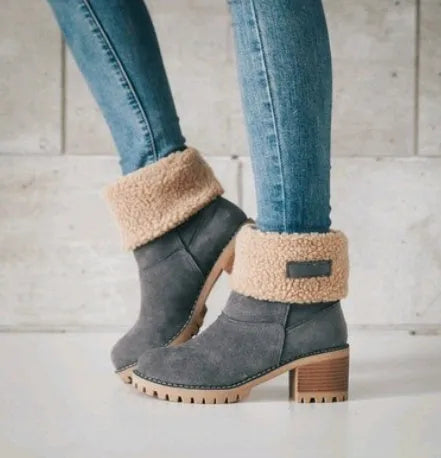 Women's mid-calf suede snow boots with a low heel and round toe in multiple colour options.