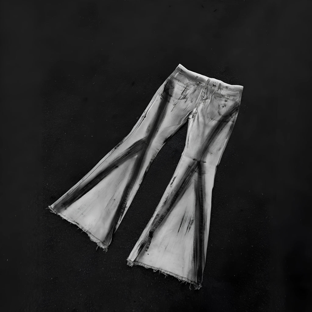 White cotton selvedge denim jeans with a mid waist and zip fly, shown on a size chart.