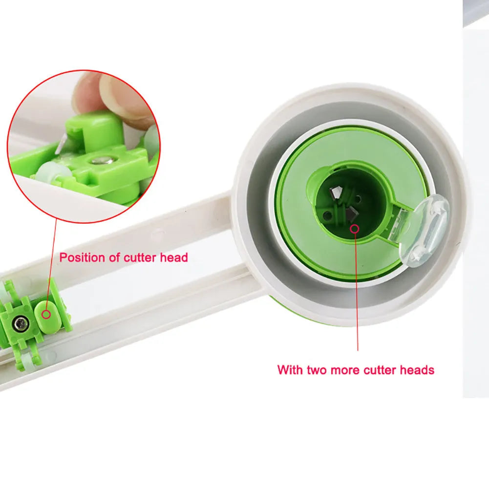 Orange plastic round paper cutter for A3 sheets on a desktop