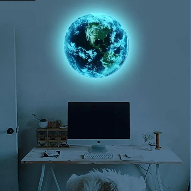Glow in the dark 3D planet Earth wall sticker in multiple sizes on a bedroom wall.