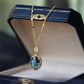 Gold geometric pendant necklace on chain with French retro design