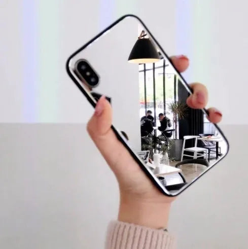 Black mirror back cover case for iPhone showing reflective surface.