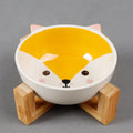Raised ceramic cat food bowl in bamboo wooden stand, 13cm bowl, pink fox design
