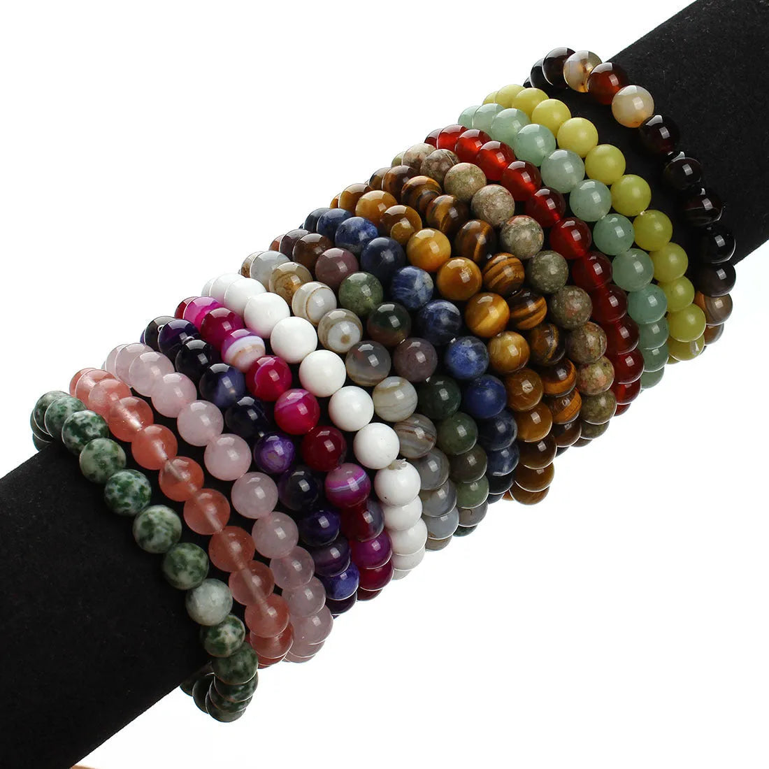 Natural stone round bead bracelet in aventurine blue sandstone with geometric design on white background