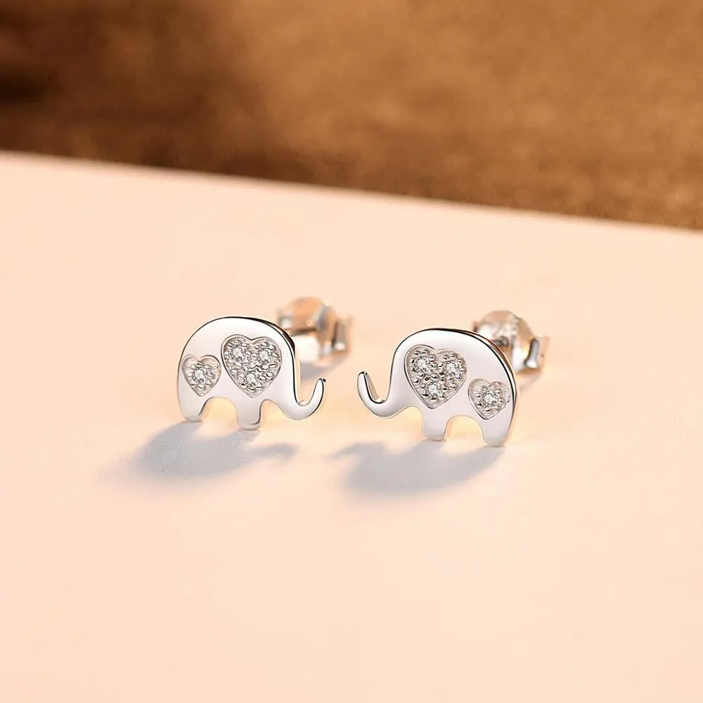 Geometric silver Korean ladies earrings with gem setting, in gold and silvery colours.