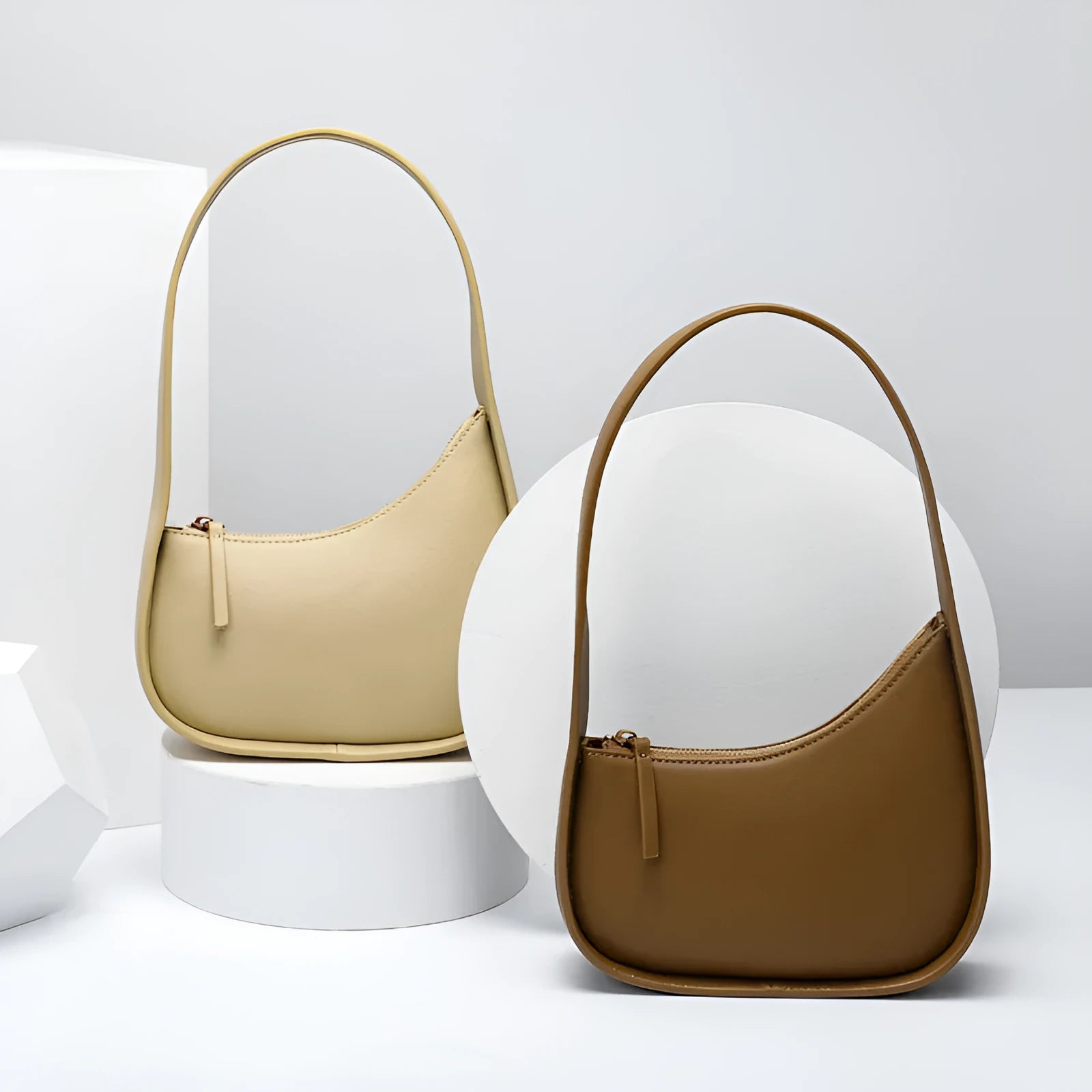 Small genuine leather half-moon women's shoulder bag with wide strap in four colour options