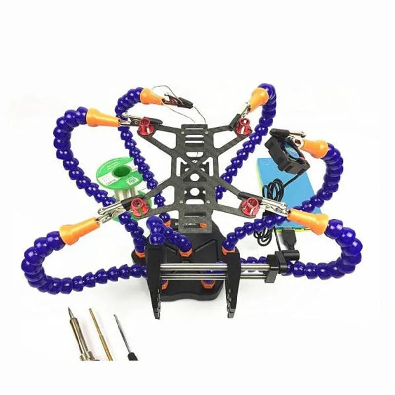 Aluminium six-claw welding station with black base and multiple adjustable arms for model repair.