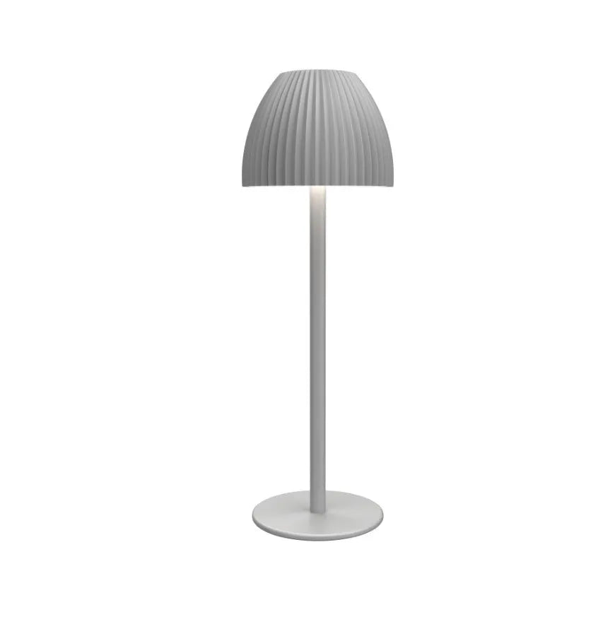 Modern dimming desk lamp in black or white with a thin round base and USB cable.