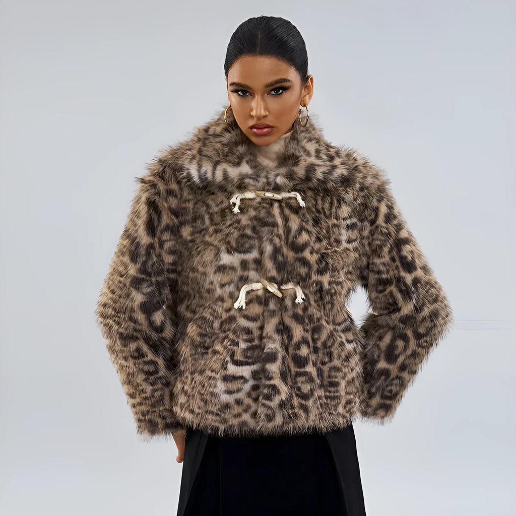 Women's leopard print polyester coat with regular sleeves on a hanger