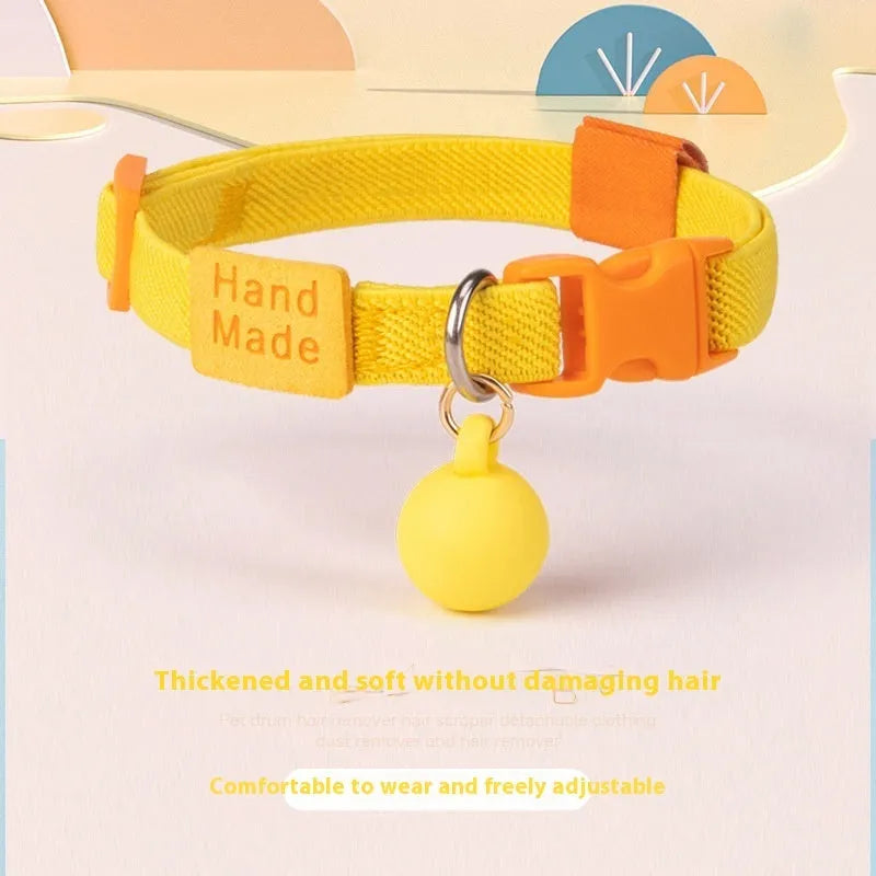 Small dog elastic polyester pet collar in multiple colours on a white background