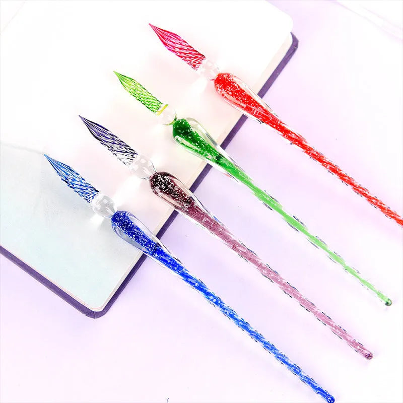 Glass dip pen with glass nib in a choice of colours, shown for calligraphy and drawing use