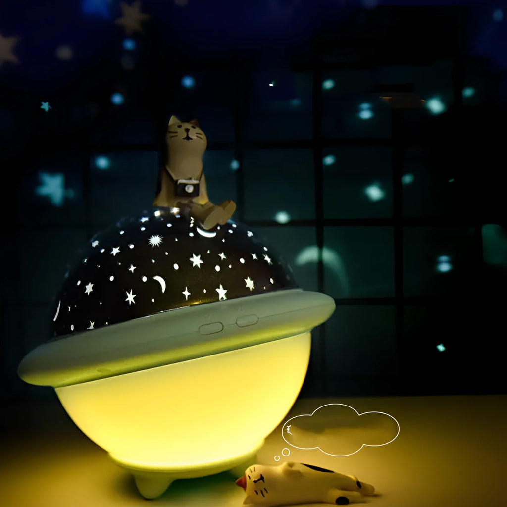UFO-shaped star projection night light with rotating star patterns in green, pink or white colours
