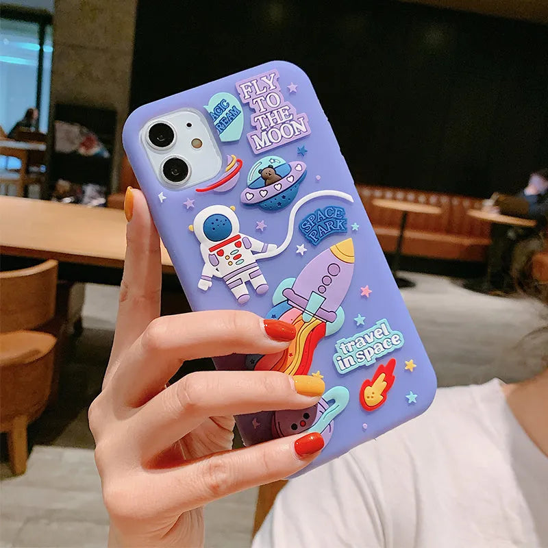 Spaceman purple silicone gel phone case with cartoon astronaut design for iPhone
