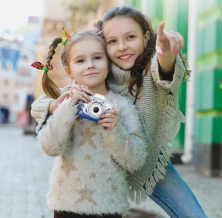 HD Cartoon Children's Digital Camera in blue or orange, showing compact size and included lanyard.
