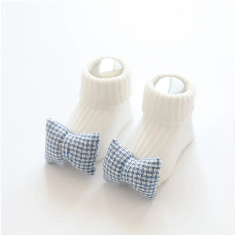Cotton baby floor socks with anti-slip soles in animal designs for infants and toddlers