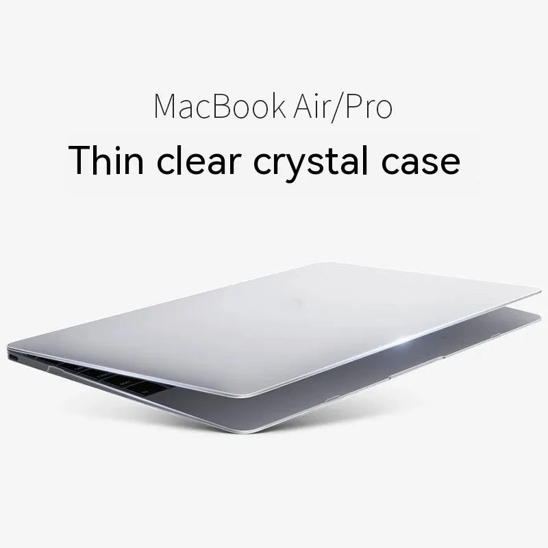 MacBook protective case in plastic shell, shown in crystal black and transparent options, fitted on a MacBook laptop