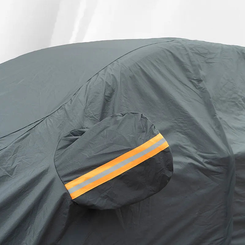 Grey Volkswagen car cover showing thickened PVC chemical fibre construction for rainproof sun protection