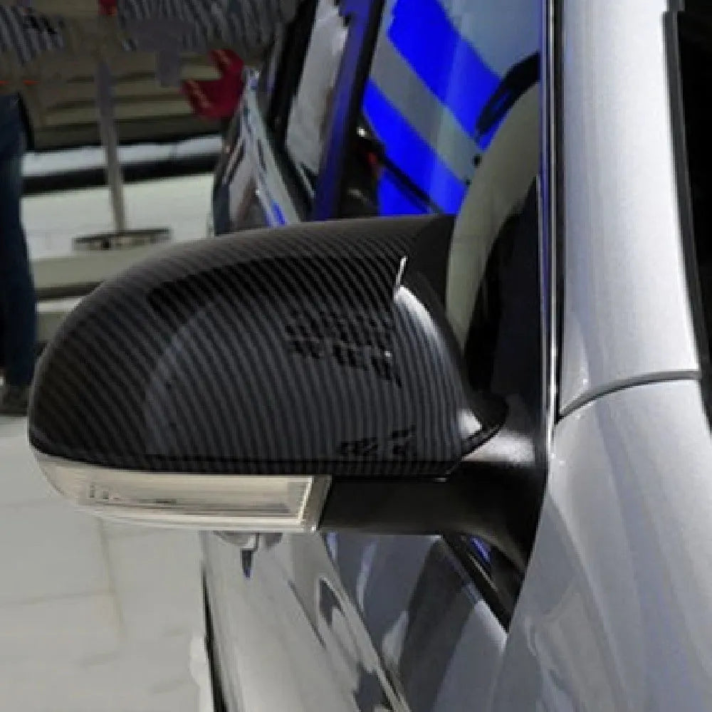 Volkswagen Sagitar car mirror reflector shell pair in horn bright black plastic
