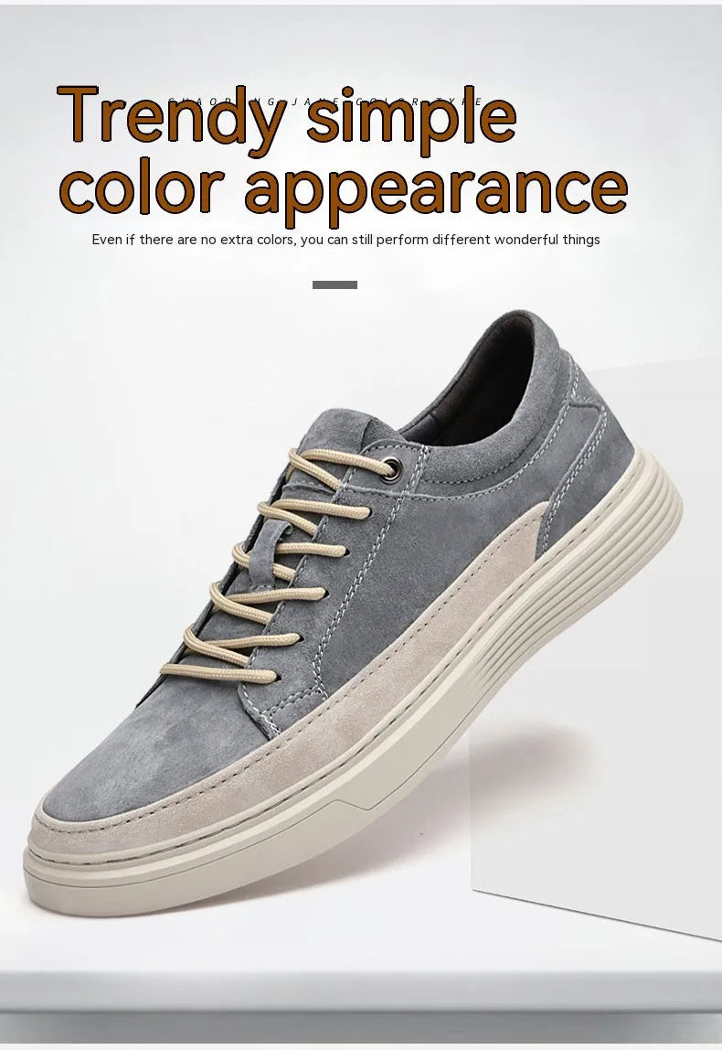 Men's grey casual skate shoes with pigskin upper and rubber sole on white background