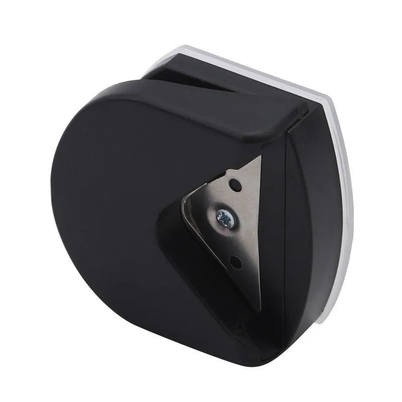 Corner cutter for paper cards and photos, plastic and metal, 5.8cm by 5.4cm by 2.5cm, in black, pink, or blue
