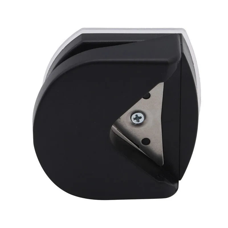Corner cutter for paper cards and photos, plastic and metal, 5.8cm by 5.4cm by 2.5cm, in black, pink, or blue